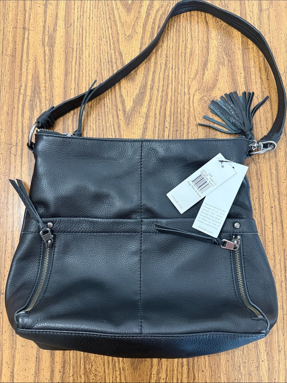 The Sak bag BNWT Black Leather Crossbody Bag with Tassel Accent